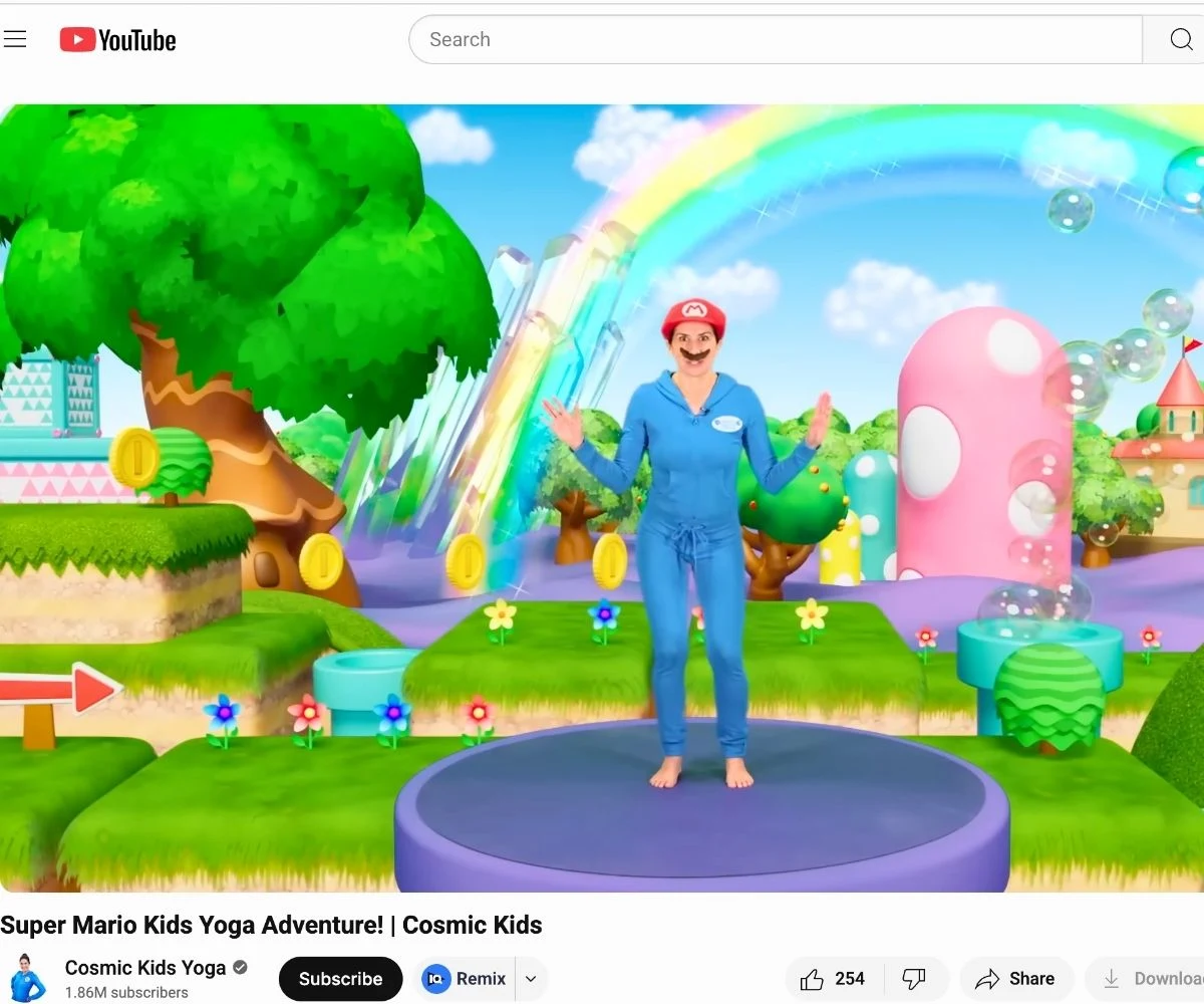 Woman in Mario hat and mustache doing yoga on colorful set