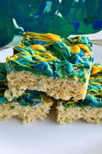 plate of three, candy-melt, graffiti-covered Rice Krispies treats