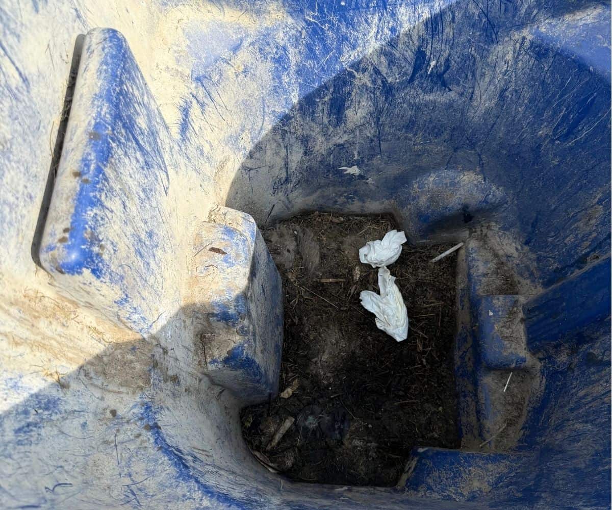 photo of inside of really dirty garbage can