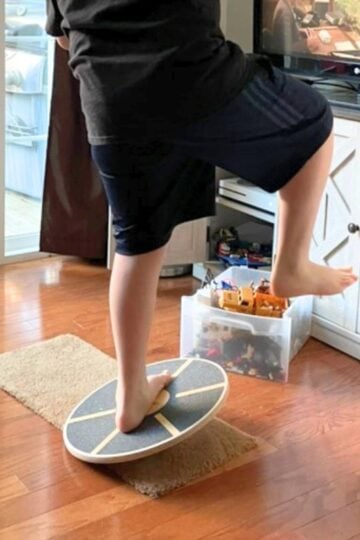 preteen boy balancing on board preteen gift idea