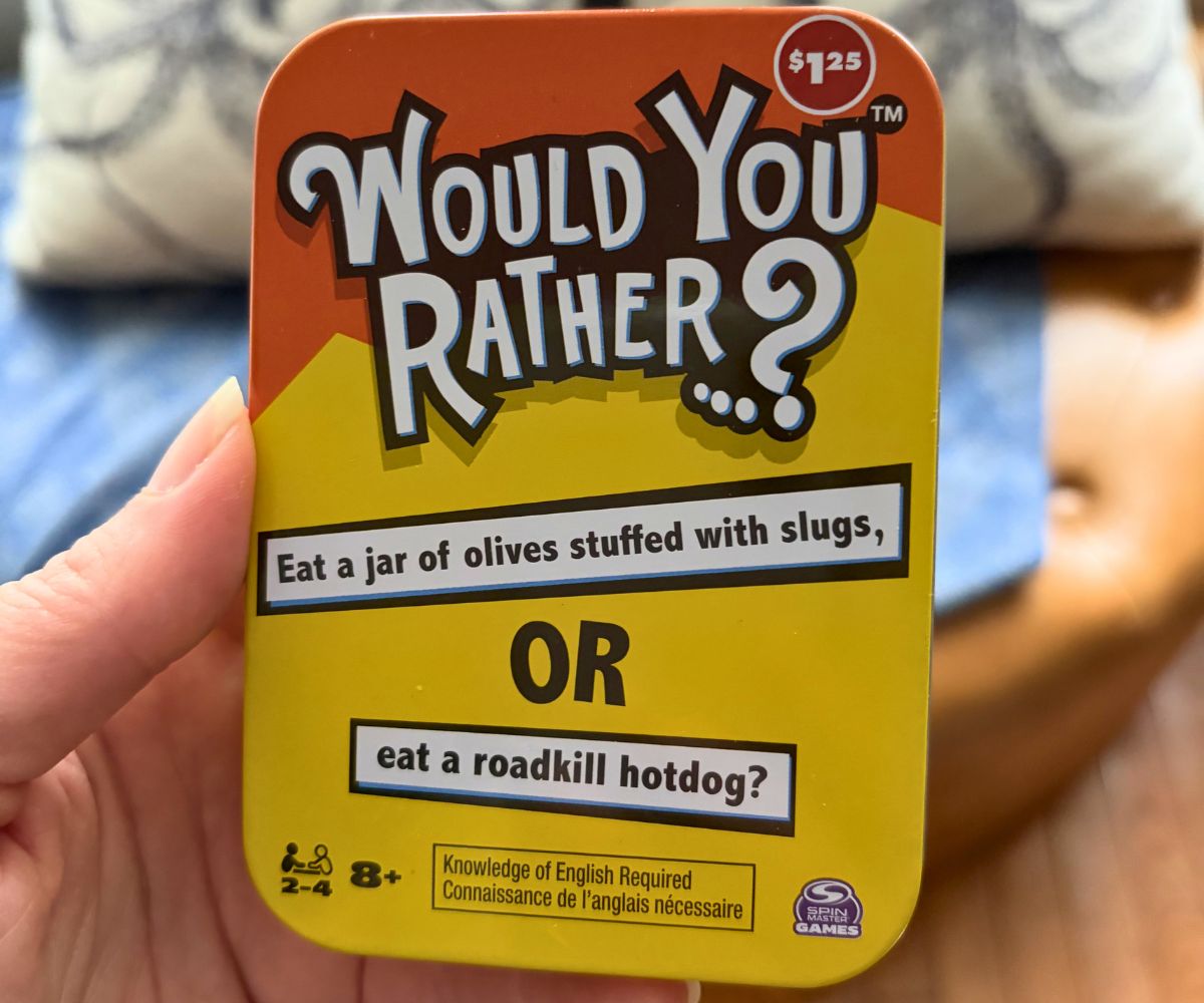 yellow and orange tin of Would You Rather cards from Dollar Tree